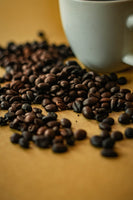 Sagada Arabica Blend coffee beans and a cup