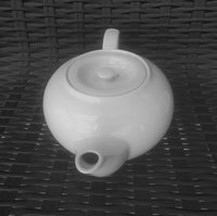 White Porcelain Tea Pot with the spout facing forward