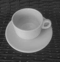 White Porcelain Tea Cup on a White Saucer