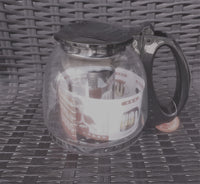 clear glass teapot with infuser