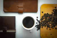 top view of Mt Apo Coffee Beans on a wooden board with coffee at the middle